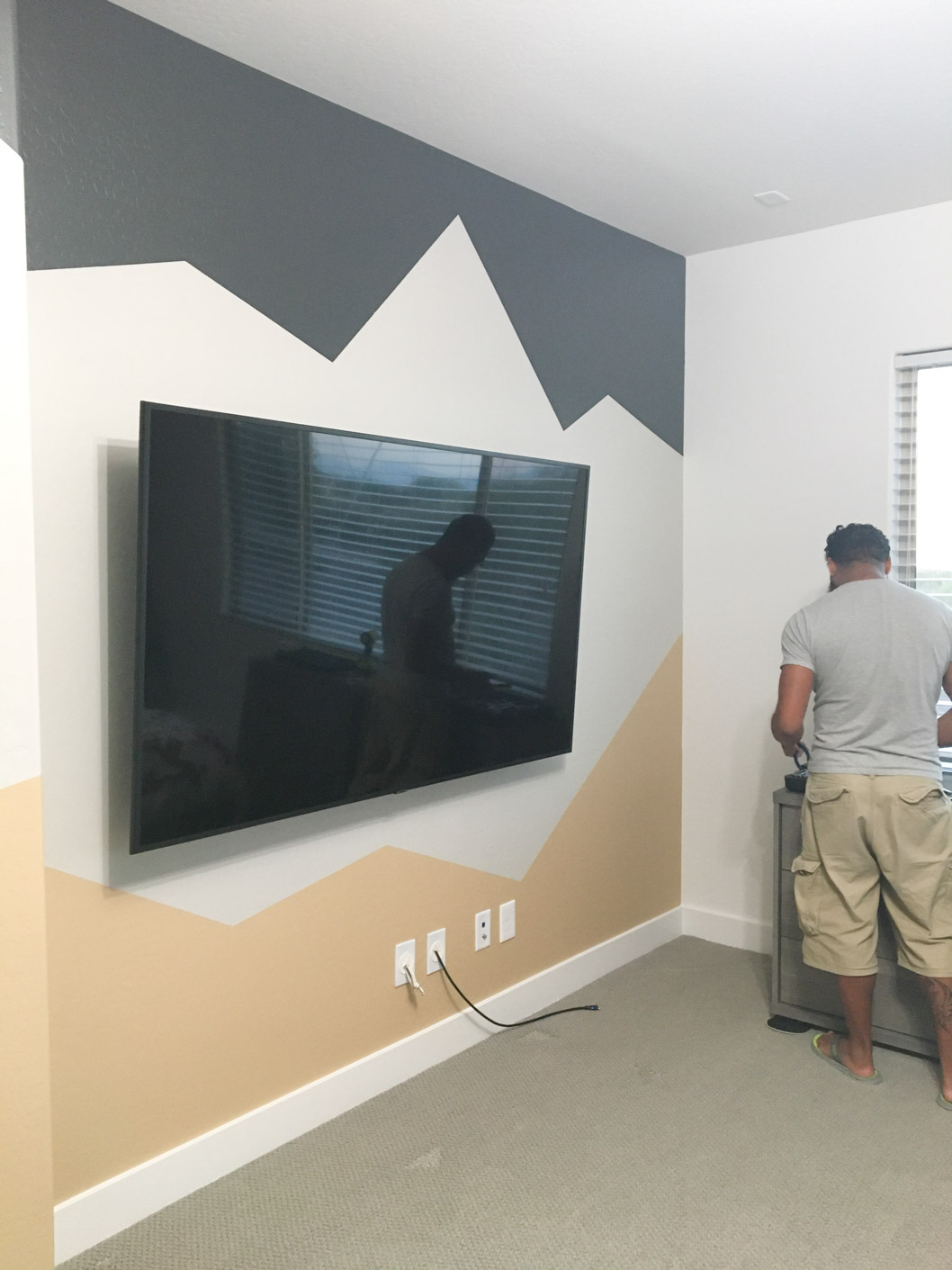 Color block painted wall with TV